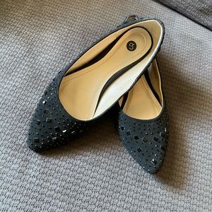 Studded black flats